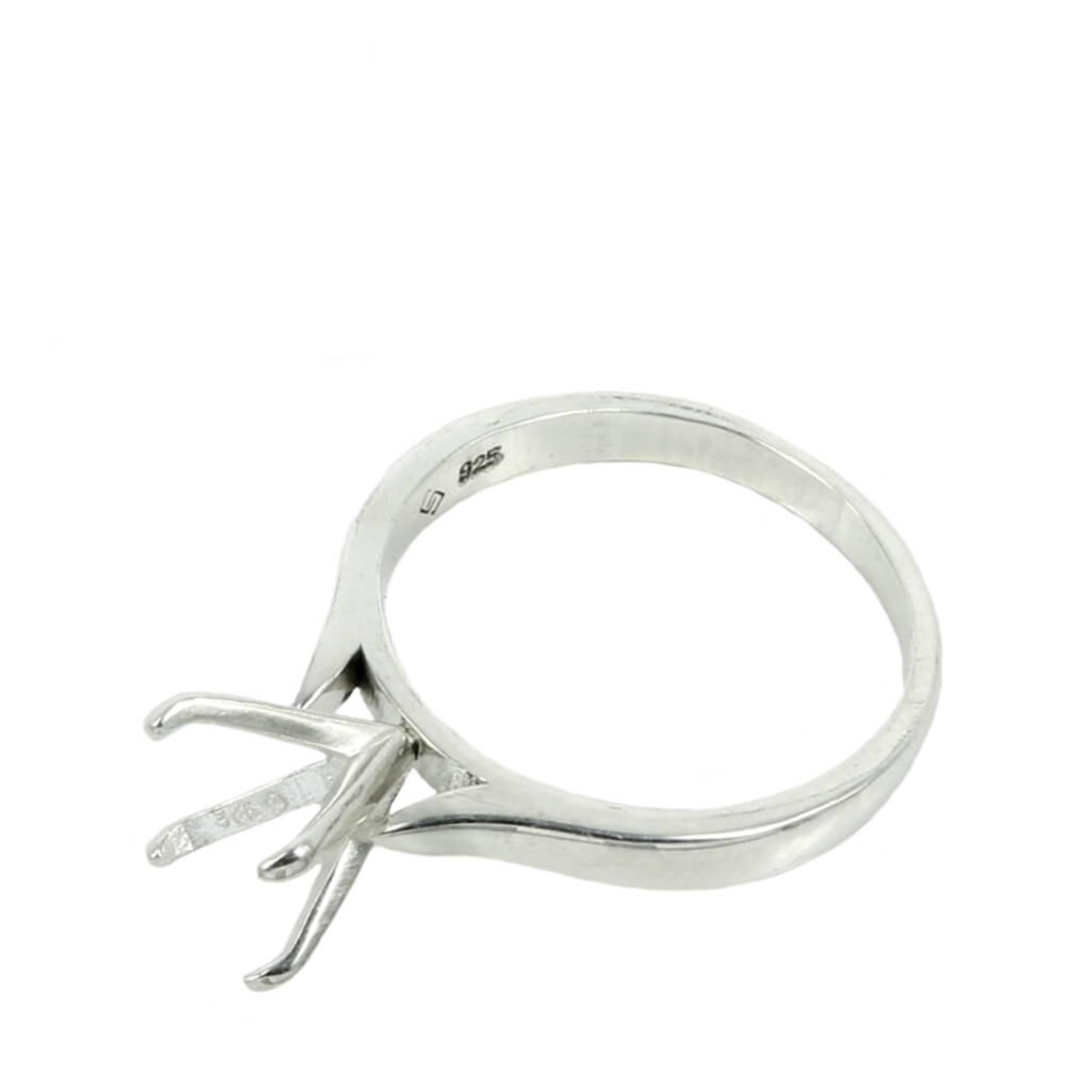 Jeweler Ring Peg Setting Four-Prong Round - example